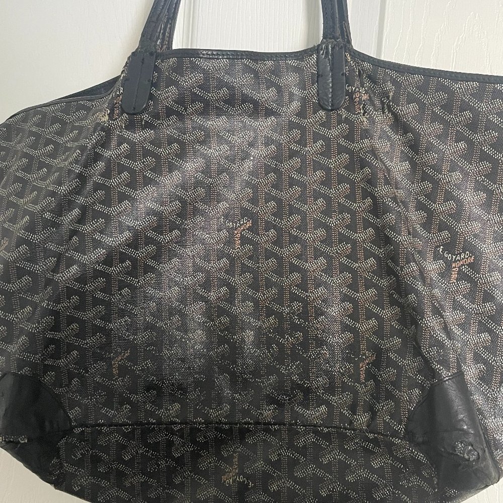 Well-loved Goyard tote ready for repair